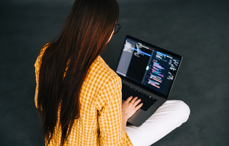 image of a coding woman who tried to change code on registry level